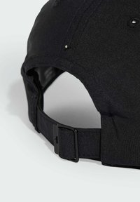 Black baseball cap with a textured fabric, featuring a curved visor and an adjustable strap with a metal buckle at the back.