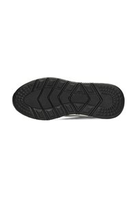 Semelle de chaussure avec une texture en caoutchouc noir présentant un motif en zigzag et des accents triangulaires pour l'adhérence. Talon plat et arrondi avec une surface texturée.