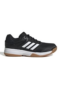 Chaussure de sport noire et blanche avec tige en mesh, trois bandes blanches sur le côté, semelle intermédiaire blanche et semelle extérieure en caoutchouc beige.