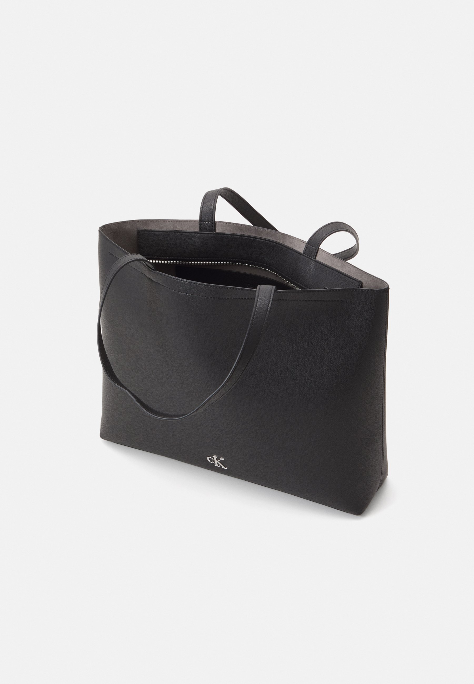 ★ ★ Women's CKJ Minimal Monogram Slim Tote Bag Calvin Klein Minimal Monogram Slim Tote Bag, Stone - Handbags
