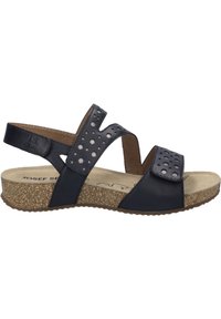 Zwarte leren sandaal met uitgesneden ontwerp, kruislings gespen en een gestructureerde kurken zool. Kenmerkt studaccenten op de bovenkant.