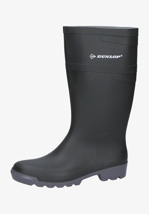 Black rubber waterproof boot with a textured surface, sturdy sole, reinforced heel, and a logo near the top. Smooth design with no embellishments.