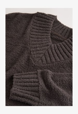 Dunkelgrauer, strukturierter Pullover mit geripptem Ausschnitt und Bündchen, gefertigt aus weichem, flauschigem Material mit lockerem Schnitt.