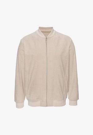 Beige corduroy jas met ritssluiting, geribde kraag, manchetten en zoom, met steekzakken aan de zijkant en een gladde ritssluiting aan de voorkant.