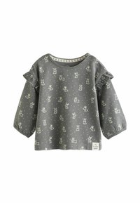 Pilkas ilgomis rankovėmis blusas su zuikio spauda, raukšlėmis rankovėse, apvaliu kaklu ir minkšta tekstūra. Apatinėje dalyje yra mažas ženkliukas.
