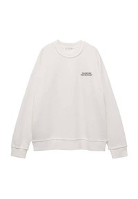 Bílá bavlněná mikina s dlouhými rukávy, kulatým výstřihem a ribovanými manžetami. Obsahuje textové detaily na přední straně, volný střih a minimální akcenty šití.