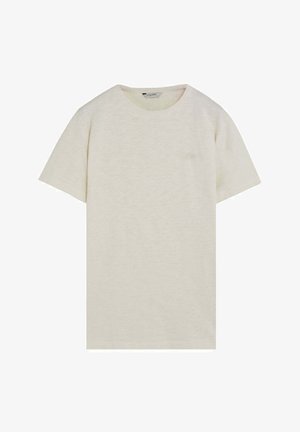 Camiseta de algodón color crema con manga corta, cuello redondo y textura sutil, colocada plana sobre un fondo blanco.