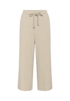 Beežid laiad püksid kõrgendatud vöökohaga ja ees sõlmitud kangast vööga.