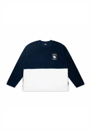 Laivastonsininen ja valkoinen väriblokkipuuvillainen collegepaita, pitkät hihat, pyöreä kaula-aukko, rinnassa logotarra, pehmeä tekstuuri ja rento istuvuus.