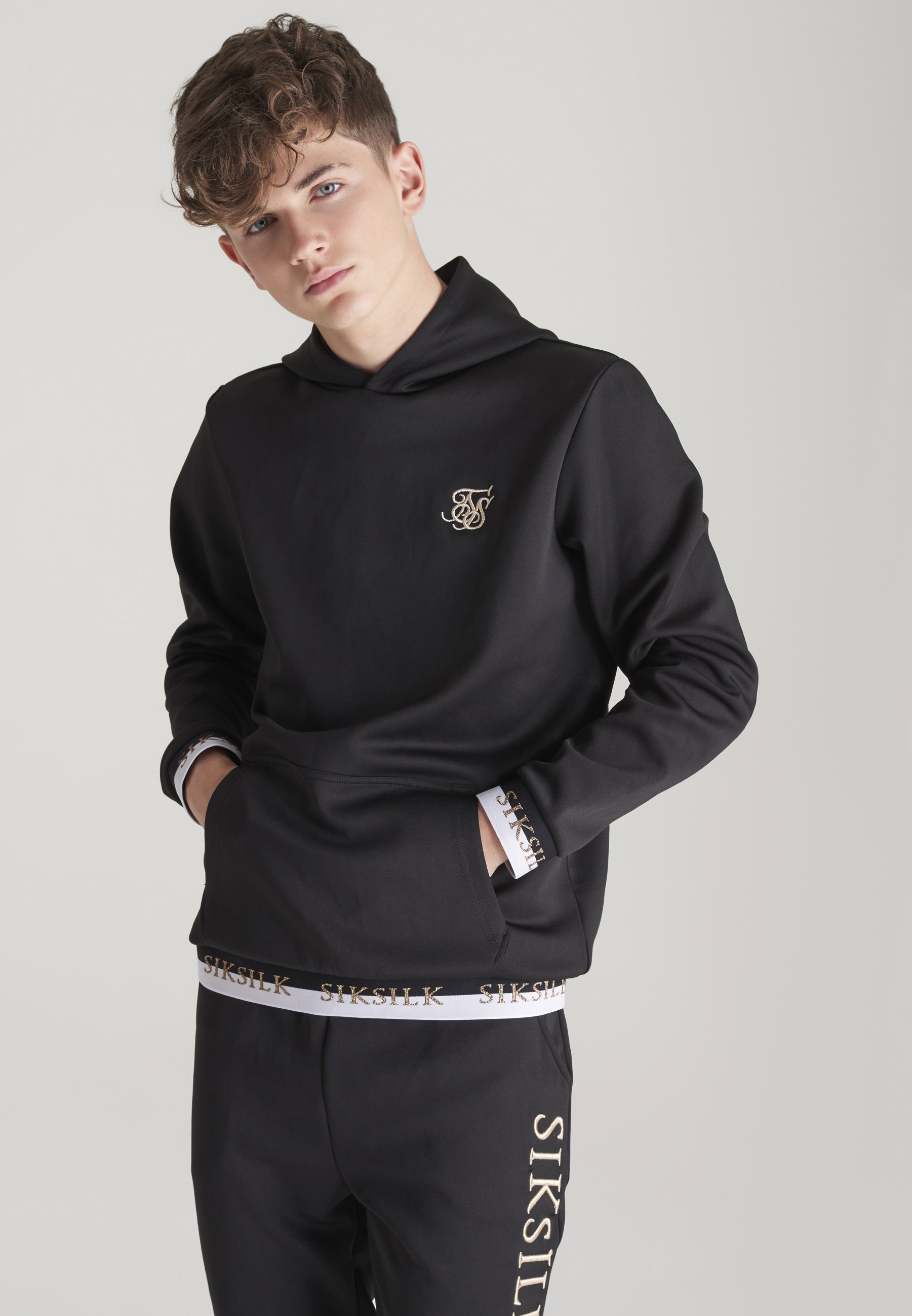 black hoodie gold writing