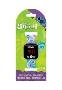 L'orologio LED Disney Stitch presenta un display digitale nero, un cinturino in silicone colorato con motivi e grafiche di Stitch, e accenti floreali.