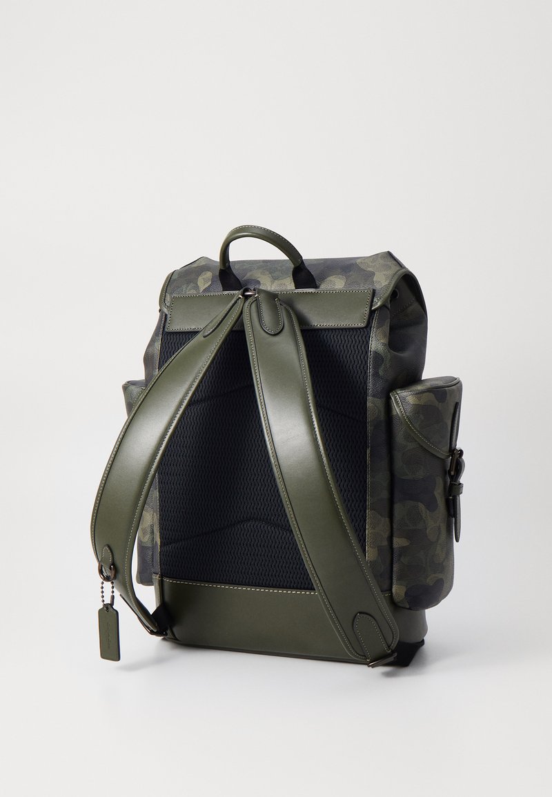 coach camo leather backpack Charter with Print  Club de Mode Signature coated canvas and smooth calf leather Two separate main compartments with zip closures Inside zip cell phone and multifunction pockets Fabric lining Top handle with 3 1/4 drop Outside zip pocket Adjustable shoulder straps 12 1/2 (L) x 16 3/4 (H) x 6 (W) Style No. Leather Backpack Green Camo Backpack