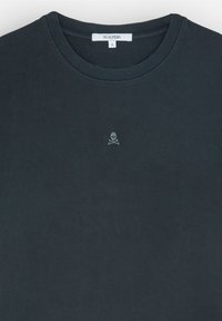 Black T-shirt made of cotton with a round neckline. Features a small gray skull and crossbones logo on the left chest area. Size S.