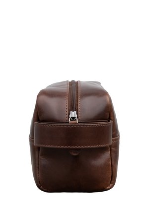 Brown leather toiletry bag with top zipper and stitched carrying strap on a white background.