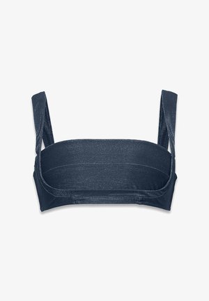 Granatowy biustonosz braletka z szerokimi ramiączkami, gładką teksturą i bezszwowym krojem. Prosty, minimalistyczny styl bez jakichkolwiek zdobień czy wzorów.