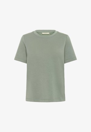 Camiseta verde de manga corta hecha de tela suave, con un cuello redondo y un corte relajado. Diseño simple sin patrones ni detalles adicionales.