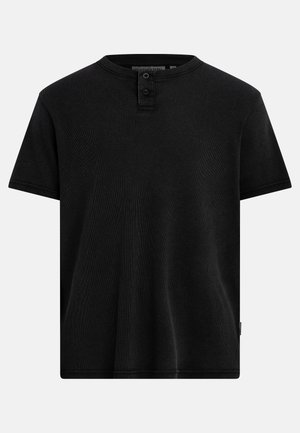 T-shirt noir à manches courtes en maille côtelée avec un col rond et une patte de boutonnage à deux boutons au centre devant.