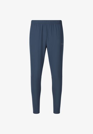 Marineblauwe slim-fit sportbroek met elastische tailleband en subtiel logo op de rechterdij, ontworpen voor actief gebruik.