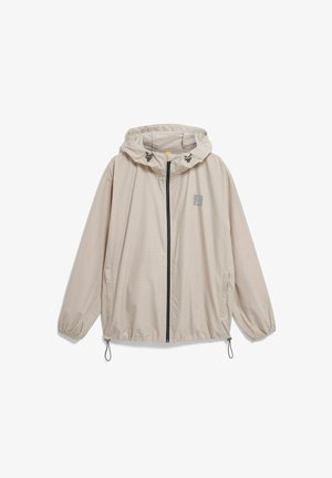 Hellbeige Kapuzen-Windjacke mit Frontreißverschluss, elastischen Bündchen, Kordelzug am Saum und kleinem Logo auf der Brust.