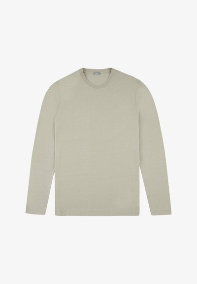 Camiseta de manga larga de color beige claro, hecha de una tela suave, con cuello redondo y un diseño simple, sin patrones ni acentos visibles.