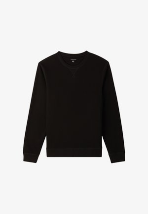 Czarna bluza z miękkiego materiału z okrągłym dekoltem. Posiada ribbowe mankiety i dół, z haftowanym wzorem krzyża przy dekolcie. Rozmiar XL.