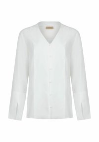 Camicia bianca a maniche lunghe in tessuto leggero, scollatura a V, chiusura con bottoni frontali e maniche sfilate per ulteriore stile e comfort.