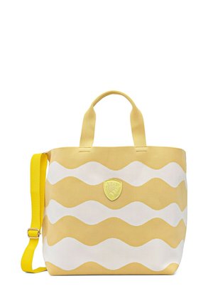 Borsa a tracolla in tela gialla e bianca con strisce ondulate, due manici corti e tracolla gialla regolabile, con un piccolo emblema davanti.