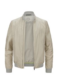 Helles beiges Bomberjacke mit glatter Textur, gerippten grauen Bündchen und einem Reißverschluss vorne. Innen ist die Jacke mit einem Netzfutter und subtiler Markenkennzeichnung ausgestattet.