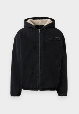 Black hooded jacket with a zippered front, fleece lining, and elastic cuffs. Features a chest pocket and logo detail on the upper left side.