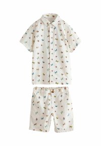 Set di camicia a maniche corte e pantaloni corti in tessuto bianco con motivi colorati di cani e fiori. Chiusura con bottone sui pantaloni corti. Materiale testurizzato.