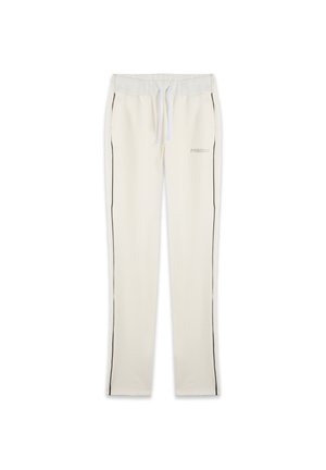 Pantalons de survêtement beige clair en tissu doux, dotés d'une taille à cordon, de bandes latérales noires et d'un petit logo "FREDDY" sur le devant.