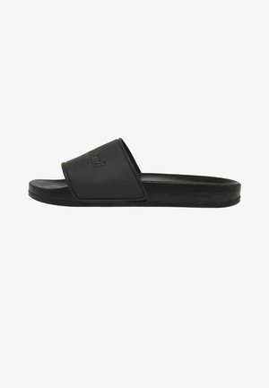 Black open-toe slide sandal with textured sole and wide strap across the foot, featuring subtle embossed branding on the strap.
