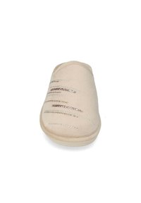 Pantofole beige con una parte superiore morbida e testurizzata. Presentano dettagli metallici a strisce nella parte anteriore per un tocco in più. Design con punta chiusa.