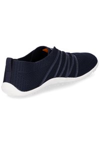 Navy blue mesh athletic shoe with white rubber sole, featuring elastic bands across the upper and a textured finish.