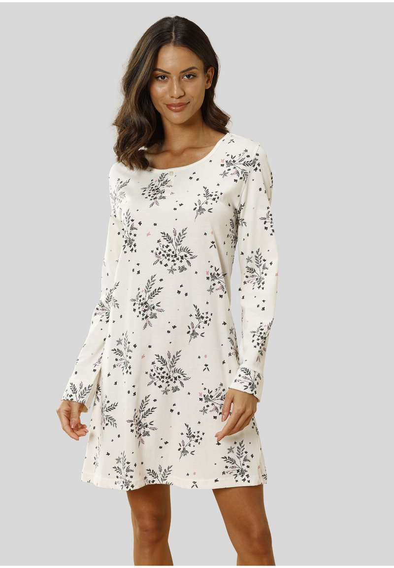 Robe à manches longues en tissu crème avec un imprimé floral noir, rose et vert. Coupe décontractée avec un col rond et une longueur au genou.