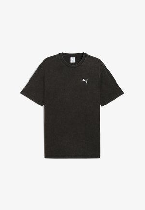 Črno bombažno majico s krožno obrobo, kratkimi rokavi in unikatno teksturo. Ima majhen beli logo Puma na prsih.