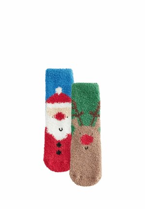Ein Paar flauschige Socken: Eine zeigt den Weihnachtsmann in Rot und Weiß auf einem blauen Hintergrund, die andere stellt ein braunes Rentier mit grünen Akzenten dar.