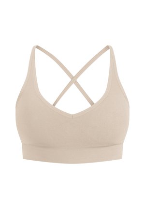 Beige bralette lavet af strækbart stof, med en V-hals, bred bærestykke forneden, og krydsende stropper på ryggen.