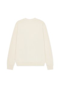 Sweat-shirt crème à manches longues avec un col rond et des poignets côtelés. Texture douce et lisse sans motifs ni graphiques visibles.