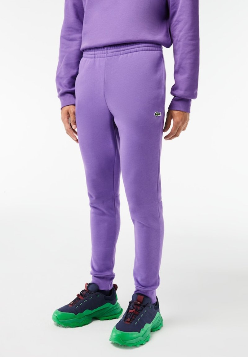 Lacoste Tracksuit bottoms purple Zalando