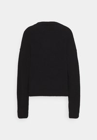 Pull noir à manches longues avec col rond, en tissu doux et texturé, avec des poignets et un ourlet côtelés vu de dos.