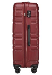 Valigia rigida di colore bordeaux, con superficie testurizzata, lucchetto a combinazione e maniglia laterale. Quattro ruote girevoli per un facile trasporto.