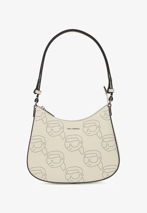 Svetainio odos rankinė, išlenkta forma, juodos detalės ir taškinė žinomo veido dizaino tekstūra. Turi reguliuojamą petnešą.