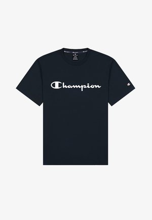 Granatowy bawełniany t-shirt z białym logo „Champion” na przodzie, okrągłym dekoltem typu crew oraz krótkimi rękawami. Klasyczny krój.