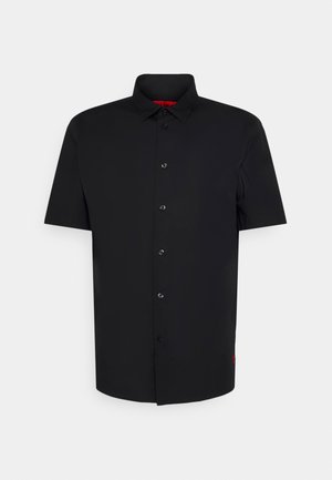 Short-sleeve black button-up shirt made of smooth fabric, featuring a classic collar and subtle red logo detail at the hem.