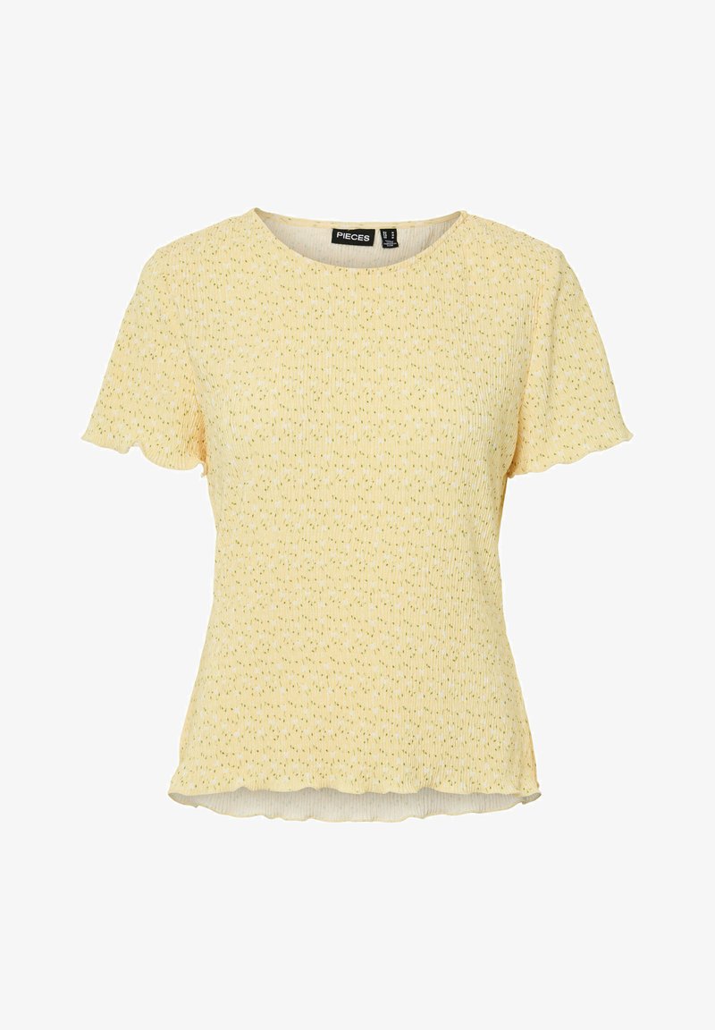 Haut jaune à manches courtes en maille côtelée avec un petit motif floral, bords festonnés aux manches et à l'ourlet, encolure ronde et silhouette ajustée.