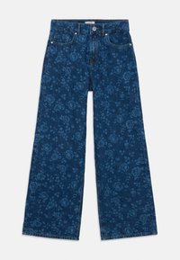Blå denim byxor med vida ben och blommönster, utrustade med knapp- och dragkedjestängning, bälteöglor och framfickor.