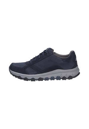 Dark blue casual sneaker with lace-up front, padded ankle collar, and thick gray sole with textured black tread.
