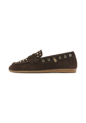 Dark brown suede loafer with gold-tone studs and eyelets, flat rubber sole, and a small decorative charm on the side.