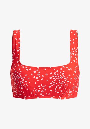 Haut de bikini floral rouge avec un décolleté carré, featuring des motifs de fleurs blanches, des bretelles épaisses et un tissu lisse et extensible.